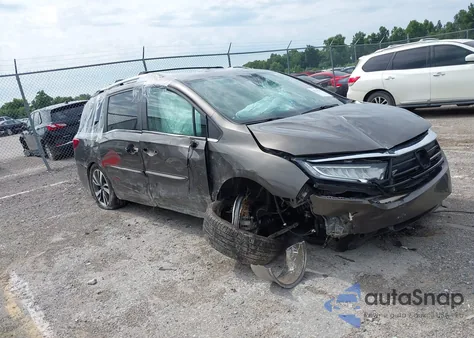 2021 Honda Odyssey Touring z USA, uszkodzony, nr VIN 5FNRL6H84MB002272